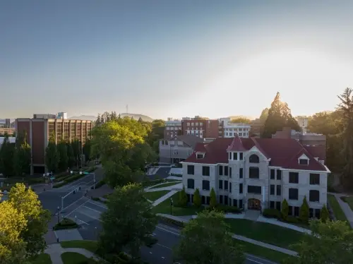 Sunsetting behind Furman Hall and Kerr Admin buildings